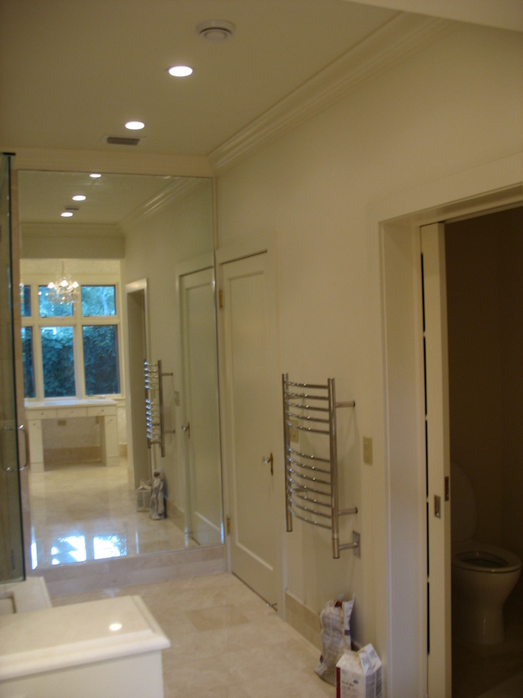 New master bath entry with a mirrored wall