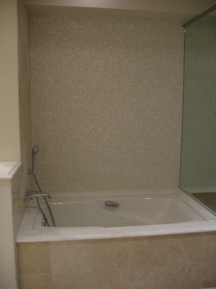 Gorgeous tub area with Mother of Pearl mosaic tiles